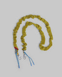 BUNGEE STRAP (MUSTARD VINTAGE) / TOPOLOGIE
