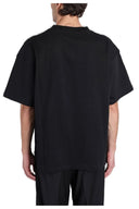 CAMISETA NEGRA CON " A PAPER KID " EN BLANCO / A PAPER KID