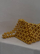 BOLSO DORADO TRIANGULAR  / SIZRU