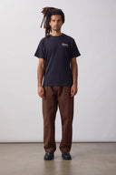 CAMISETA EATING ADVENTURES - NEGRA / SERVICE WORKS
