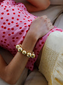 PULSERA DE ORO BOLA DE NIEVE / SUSMIES
