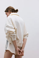 SHORT CRUDO LOGO TNS / THE NEW SOCIETY